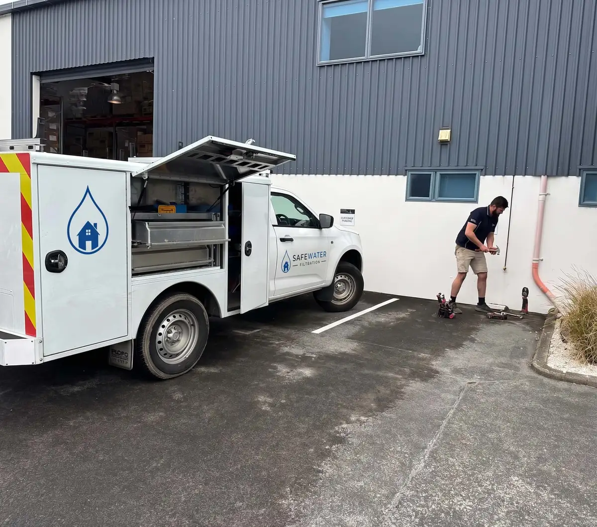 Water Filtration Sydney service vehicle and installer at a commercial premises
